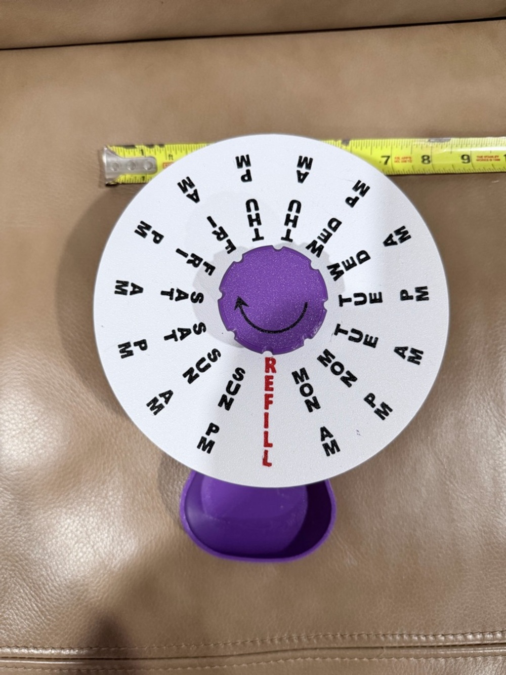 3D-printed 7 in pill organizer wheel designed to track medication dosages by day